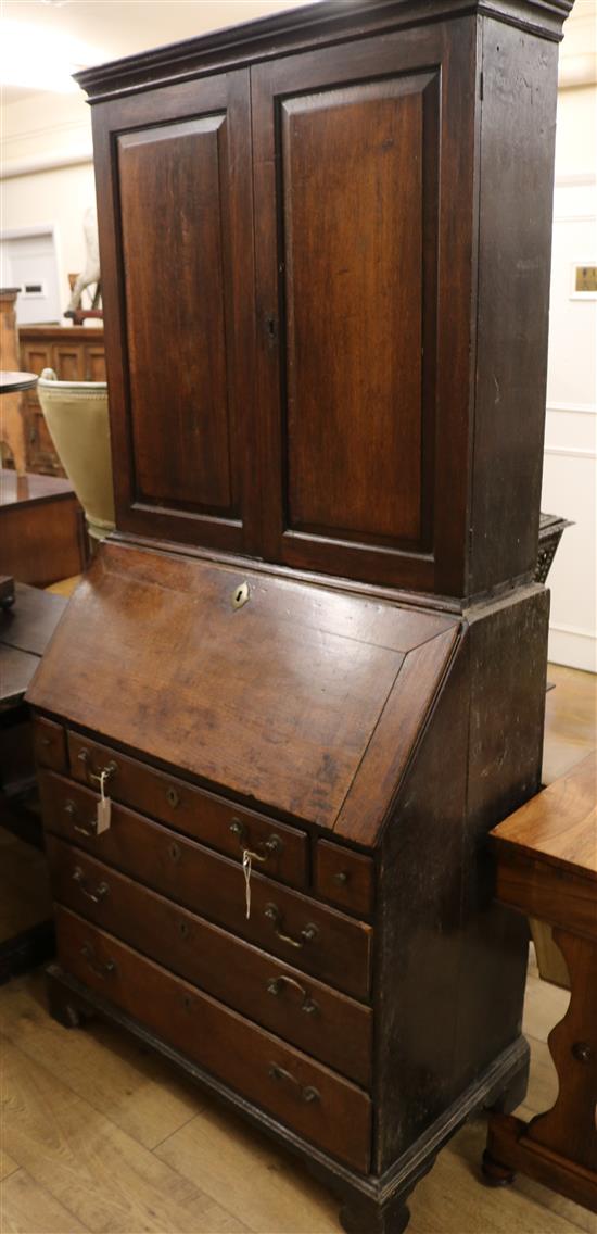 A George III oak bureau bookcase W.95cm